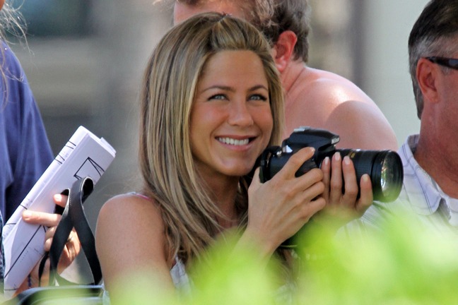 Jennifer Aniston, white blouse, camera